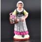 femme au panier de fleurs
